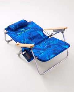 Blue Tommy Bahama reclining beach chair with wooden armrests and cup holder